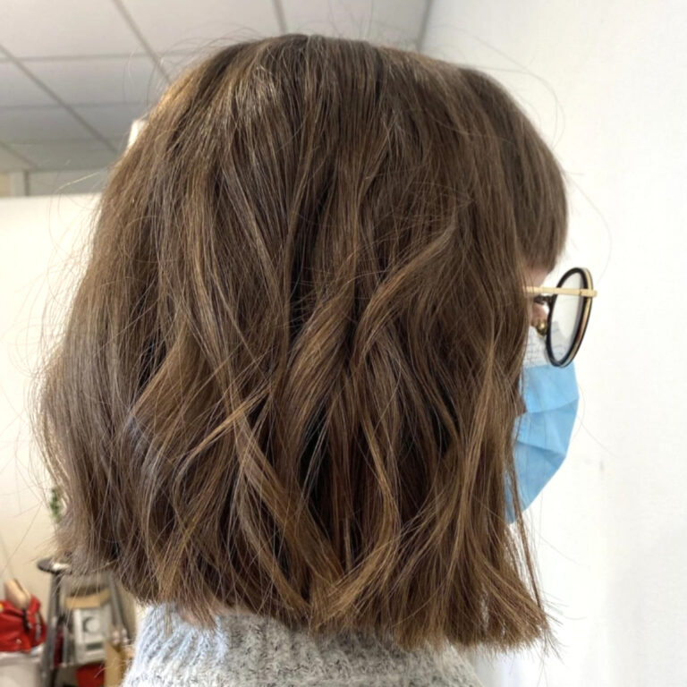 Salone Elisabetta, parrucchiera a Eraclea: primo piano vista da dietro dei capelli di una ragazza appena uscita dal Salone Elisabetta