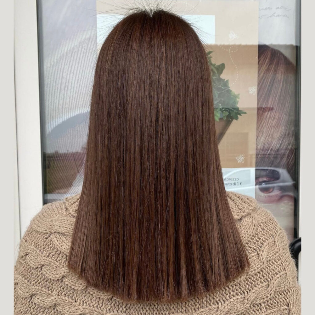 Salone Elisabetta, parrucchiera a Eraclea: primo piano visto da dietro dei capelli dopo il trattamento di lisciatura